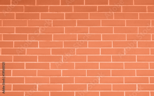 Texture of coral color brick wall as background