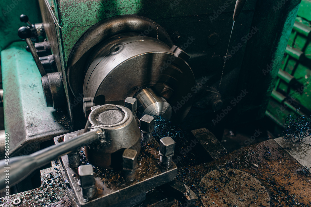 Fototapeta premium Metal processing technology on a vintage metal cutting machine