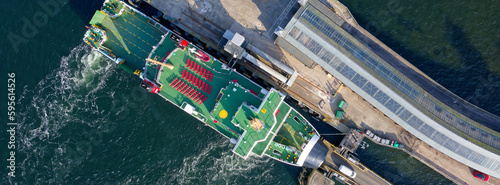 Ferry ship arriving at Scottish town of Wemyss Bay photo