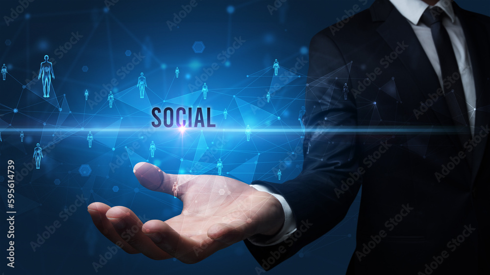 Fototapeta premium Hand holding social media related inscription