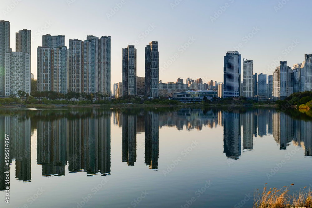 view of downtown city skyline with lake