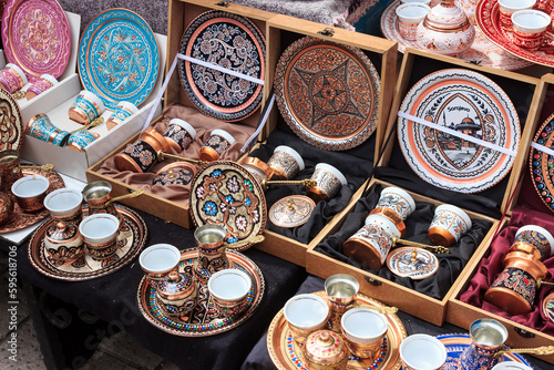 Traditional coffee pots in a souvenir shop. Turkish or Bosnian handmade coffee pots in Sarajevo.