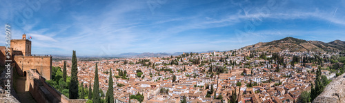 Albacin old town roofs background top view from the Generalife gardens, Alhambra castle, Andalusia, Spain. Wide angle panoramic high-resolution photo.