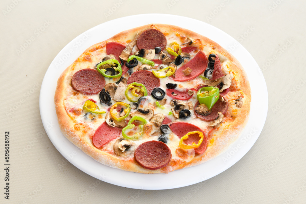 Delicious mixed pizza with rich content. Menu concept of choice and diversity. Karisik pizza Delicious mixed pizza with rich content. Menu concept of choice and diversity. Karisik pizza