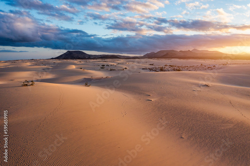 Panoramic high angle aerial drone view of Corralejo National Park  Parque Natural de Corralejo  with sand dunes located in the northeast corner of the island of Fuerteventura  Canary Islands  Spain.