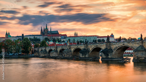 Charles Bridge in Prague in Czechia. Prague, Czech Republic. Charles Bridge (Karluv Most) and Old Town Tower. Vltava River and Charles Bridge. Concept of world travel, sightseeing and tourism.