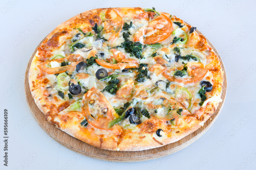 Delicious mixed pizza with rich content. Menu concept of choice and diversity. Karisik pizza Delicious mixed pizza with rich content. Menu concept of choice and diversity. Karisik pizza