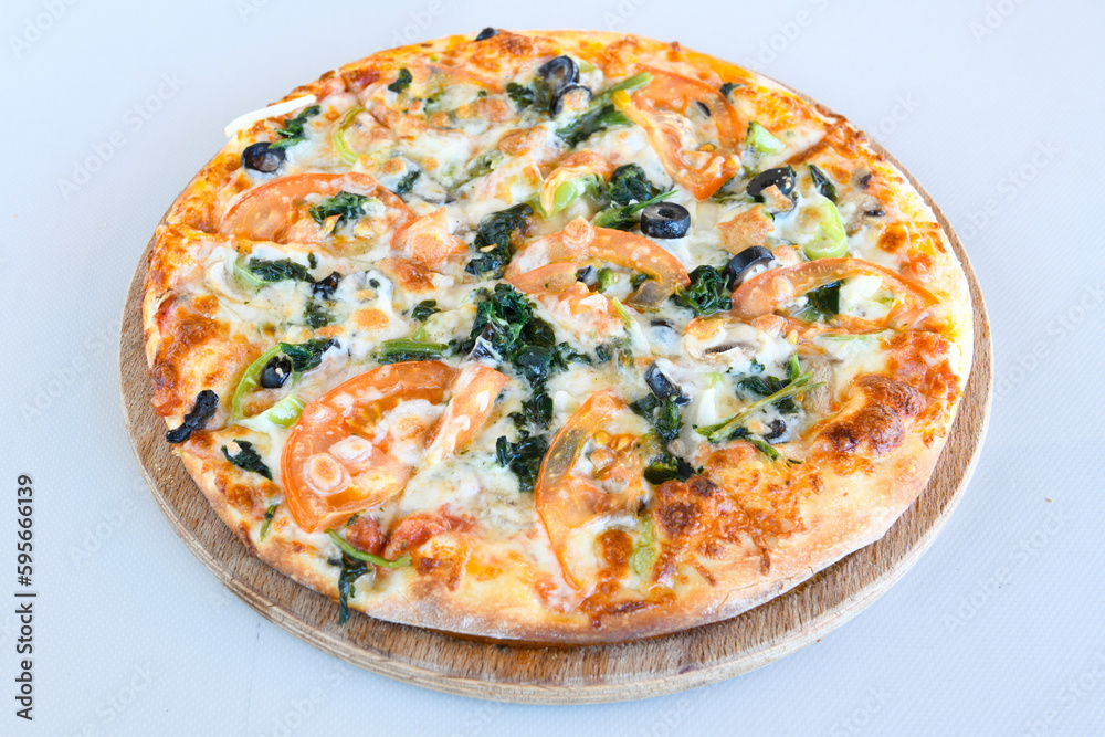 Delicious mixed pizza with rich content. Menu concept of choice and diversity. Karisik pizza Delicious mixed pizza with rich content. Menu concept of choice and diversity. Karisik pizza