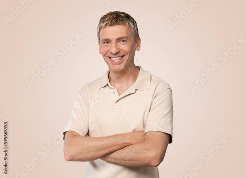 Professional smiling young guy employee posing