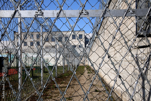Prison. Prison wall with barbed wire. law and justice photo