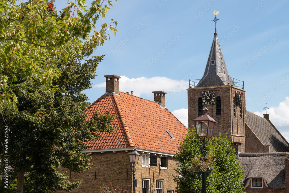 Fototapeta premium Church tower in the Dutch village of Linschoten.