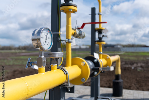Oil or gas industry. Fuel distribution system. Gas control equipment. Natural gas supplies. Yellow pipeline. Regulators and pressure reducers on gas pipelines. Industrial equipment. Telemetry at the f