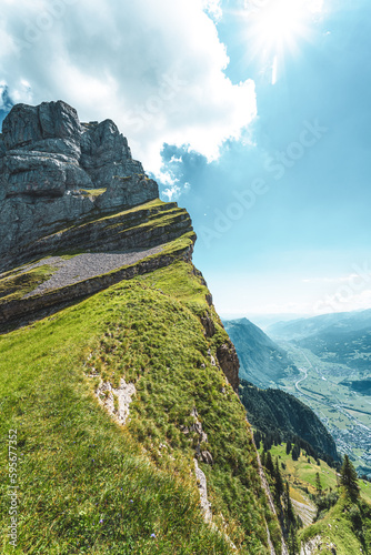 Steep view up to a Churfürsten summit from hike trail on. Schnürliweg, Walensee, St. Gallen, Switzerland, Europe.