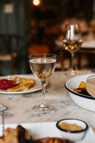 Martini on Restaurant Table with Food