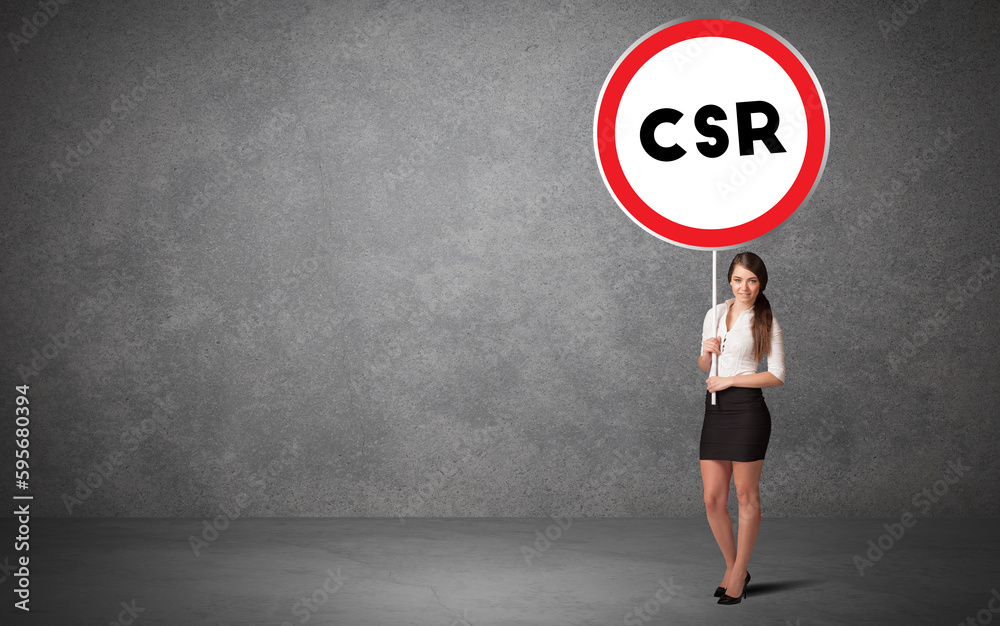 Young business person holdig traffic sign Young business person holdig traffic sign