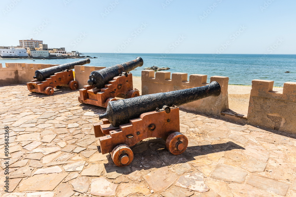 Cannons near Mirbat castle near the sea in Mirbat town, Sultanate of Oman