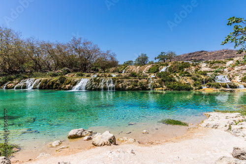 Fototapeta Naklejka Na Ścianę i Meble -  Wadi Darbat (The Darbat Valley) is the most beautiful and scenic spot with waterfalls in Dhofar Region in Sultanate of Oman