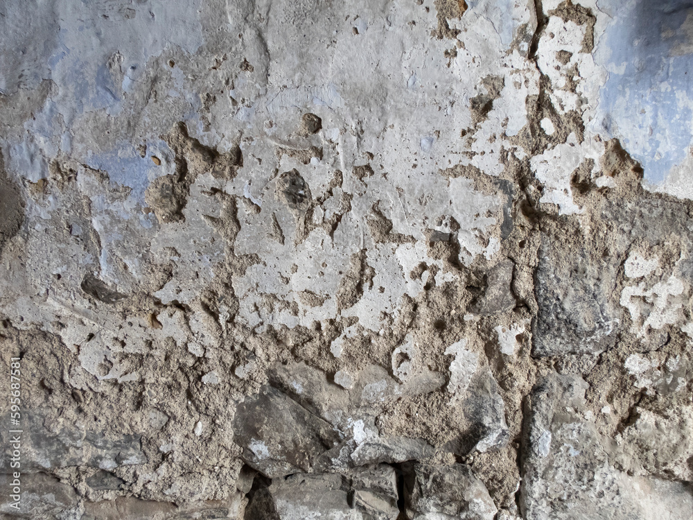 texture of a deteriorated old wall, with a partially repaired spalling, grunge cracked concrete wall, horizontal texture of a deteriorated old wall, with a partially repaired spalling, grunge cracked concrete wall, horizontal