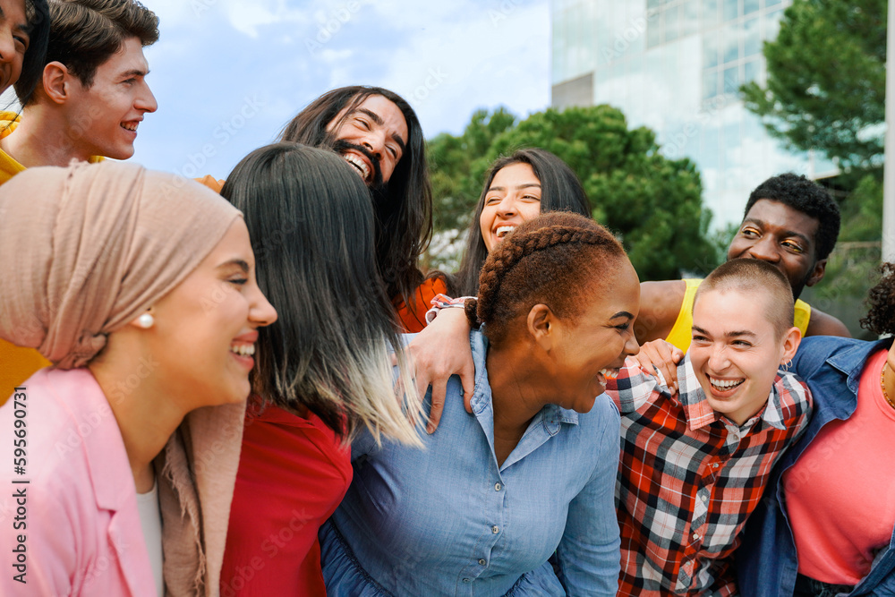 Multiethnic diverse group of people having fun outdoor in summer day- Diversity lifestyle concept Multiethnic diverse group of people having fun outdoor in summer day- Diversity lifestyle concept