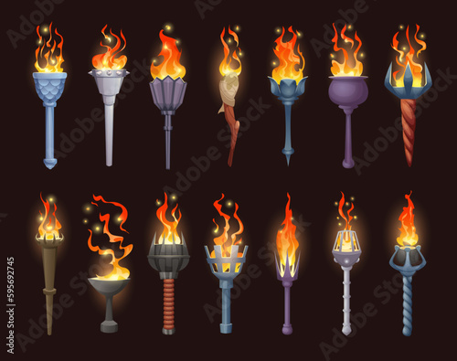 Burning torch light. Game asset tools stick burning flame exact vector illustrations set