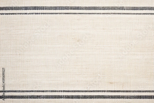 modern white and black striped rug on a wooden floor. Generative AI
