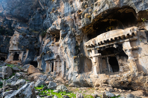 Lycian rock-cut tombs in ancient Pinara city, Mugla Province, Turkey photo