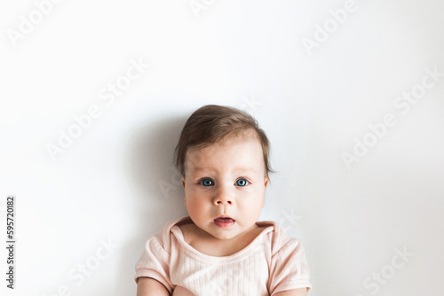 Portrait of a newborn baby with blue eyes, photo for a banner, top view. Baby photo with Copy Space For Your Text