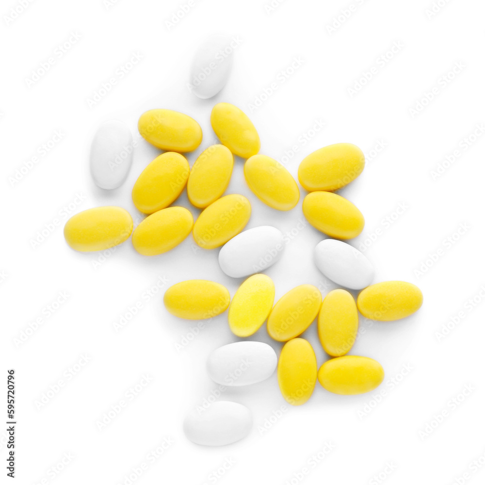Different tasty dragee candies on white background, top view Different tasty dragee candies on white background, top view
