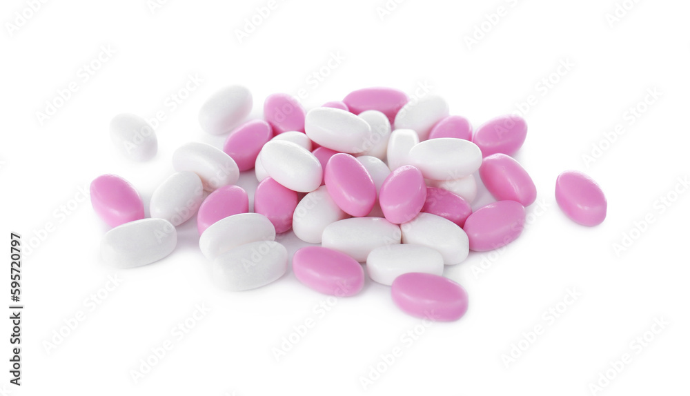 Different tasty dragee candies on white background