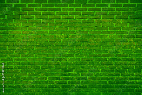 Texture of bright green brick wall as background