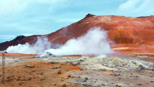 Wallpaper Mural Geothermal Area in Iceland. Martian landscape at Sulfur Valley with Smoking Fumaroles. Famous tourist spot Hverir. Real Volcanic Activity near Myvatn lake. Evaporating water. Shot in 8k resolution. Torontodigital.ca