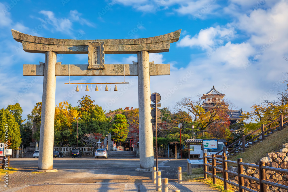 Nakatsu, Japan - Nov 26 2022: Nakatsu Daijingu Grand Shrine and shrines complex at Nakatsu Castle park, founded after Meiji Restoration, dedicated to Amaterasu and Omikami, a goddess of the sun.