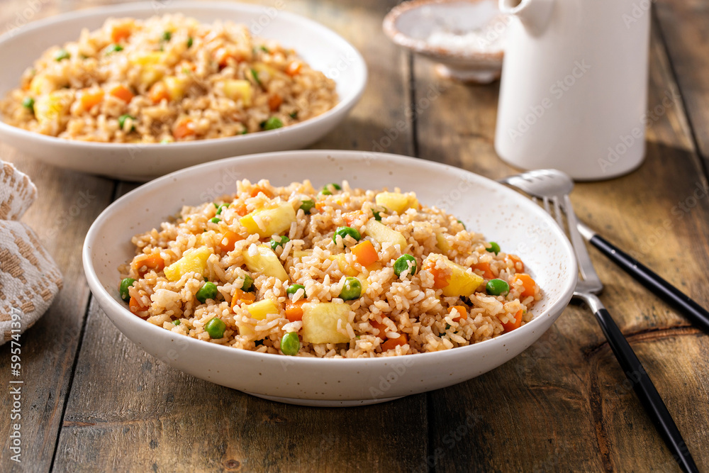 Pineapple fried rice with peas and carrots Pineapple fried rice with peas and carrots