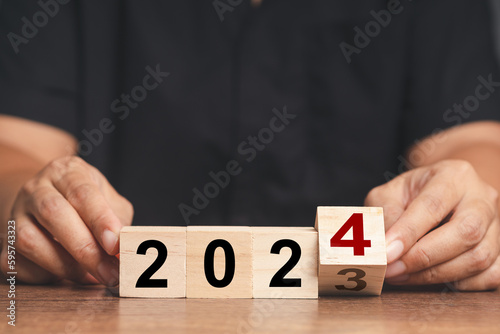 Flipping of 2023 to 2024 on wooden cubes for preparation of new year change