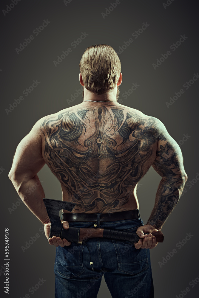 macho with tattoos