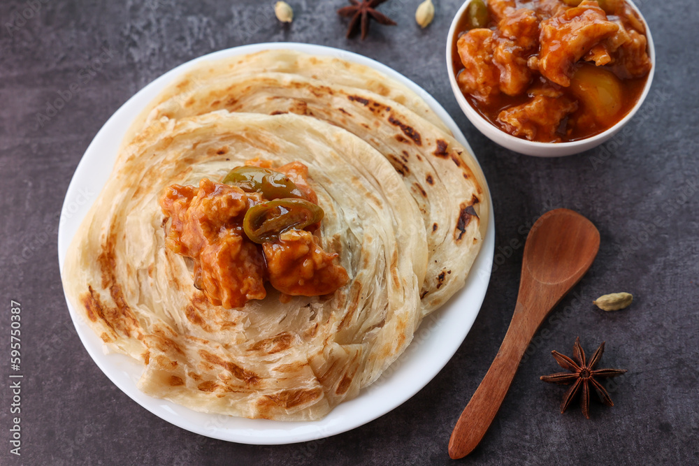 Chilly chicken with Kerala parathas porotta roti parotta barotta naan layered flatbread made