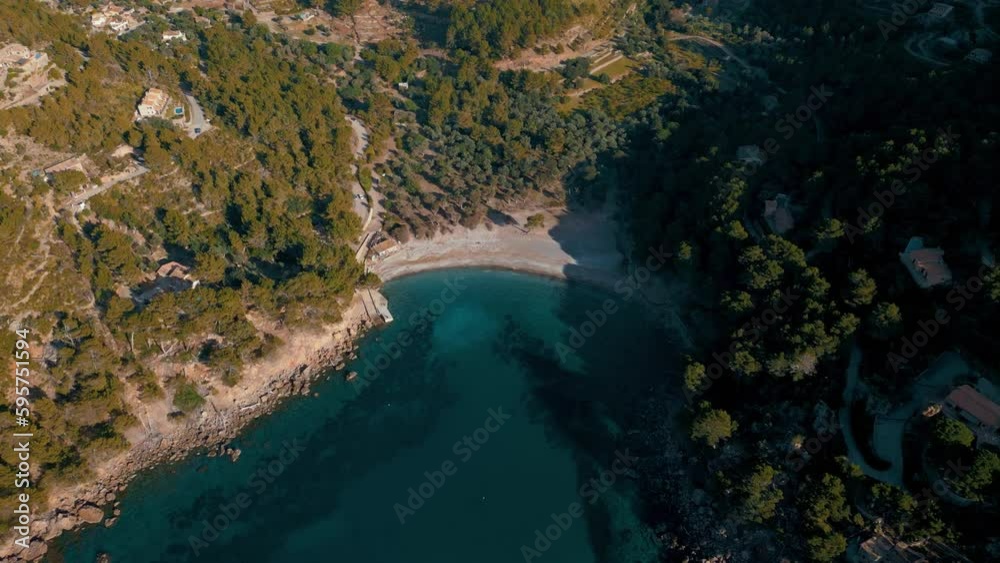 Scenic Cala Tuent, Palma de Mallorca Island, near Sa Calobra. Natural idyllic turquoise blue clear sea water, sandy beach seaside cliff coast. Spanish Balearic Majorca, cinematic aerial drone 4K UHD Scenic Cala Tuent, Palma de Mallorca Island, near Sa Calobra. Natural idyllic turquoise blue clear sea water, sandy beach seaside cliff coast. Spanish Balearic Majorca, cinematic aerial drone 4K UHD