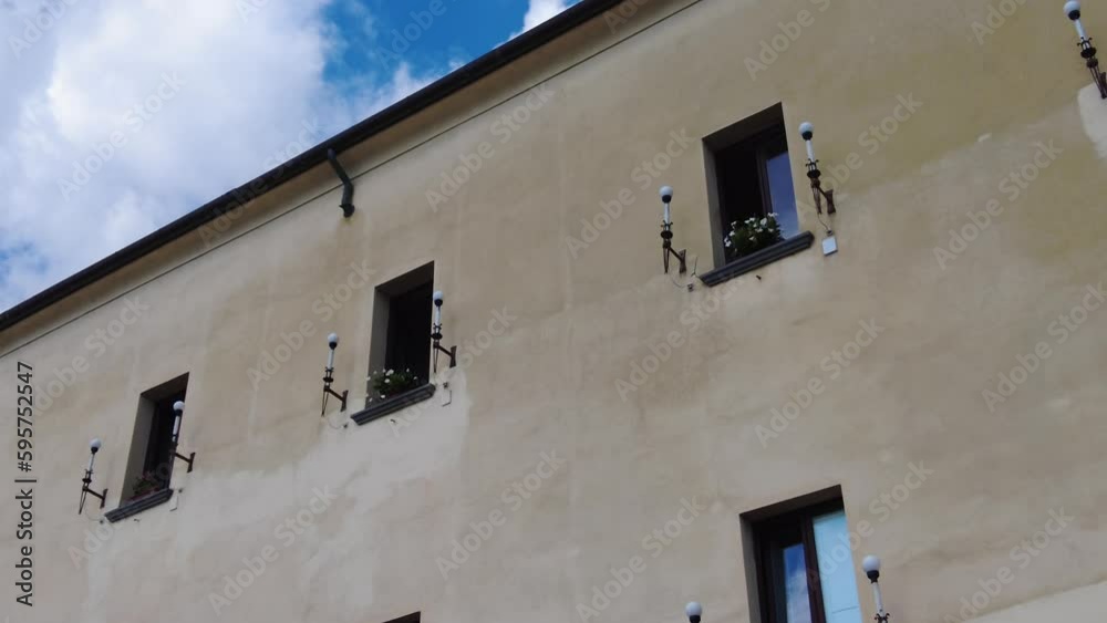 Windows With Lamps On The Building On The Side Street Of Amalfi Coast In Italy. Low Angle Windows With Lamps On The Building On The Side Street Of Amalfi Coast In Italy. Low Angle