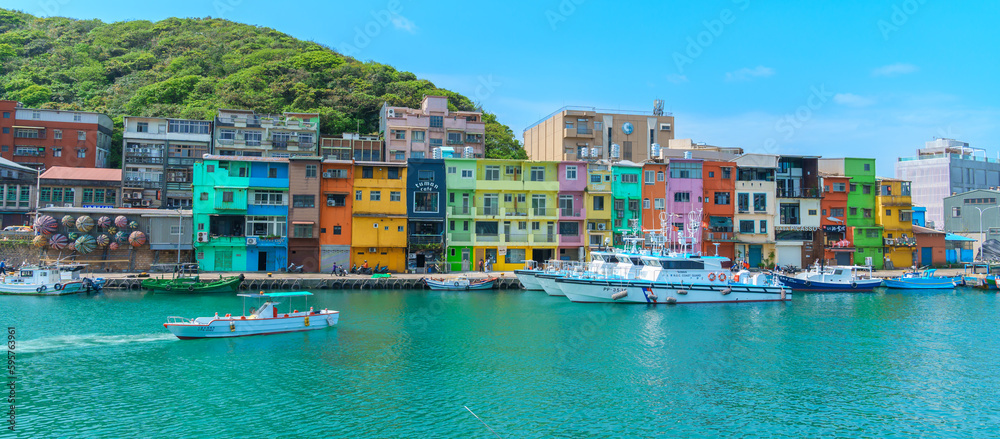 Obraz premium Landscape and Cityscape of Colorful Zhengbin Fishing Port visiting in Keelung. landmark and popular for tourists attractions near Taipei city, Taiwan