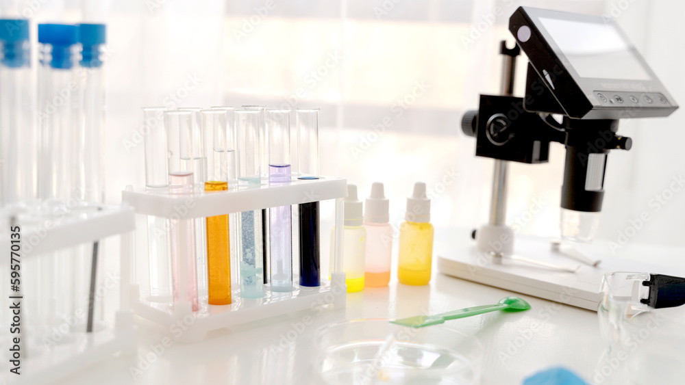test tubes and a microscope in a chemical laboratory