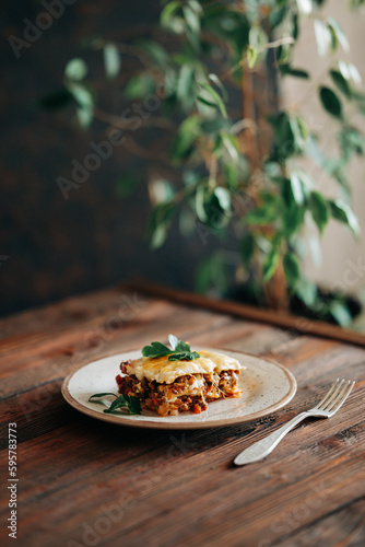 Tasty lasagna italian delicious food meals eat on the wooden dark table lyfestile still life photo