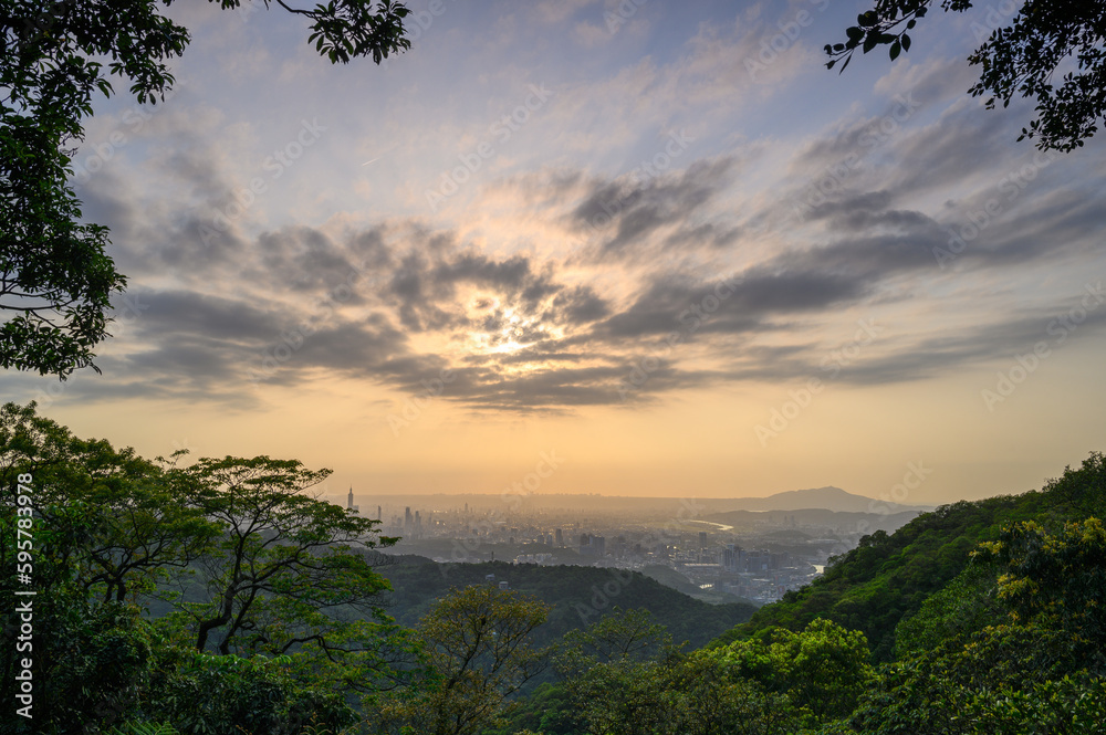 Vibrant sunset view of Taipei City. Dynamic cloud. Spectacular Evening Views of Taipei: Dynamic Clouds and Cityscape.