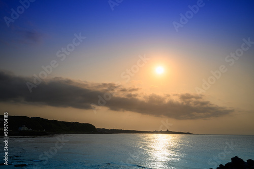 Playing in the beach  looking for fish and crabs  watching the sunset. A great place to visit in the summer is Shimen Cave on the north coast. Taiwan