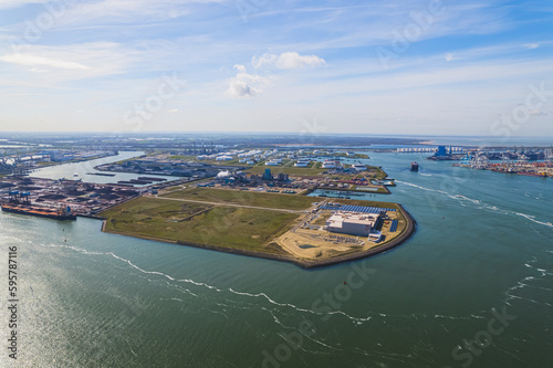 Aerial flight over harbor area industrial landscape in Maasvlakte port, Netherlands. High quality photo photo
