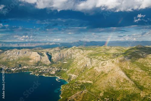 Amazing aerial view with a rainbow and Adriatic coastline in the Dalmatian region in Croatia