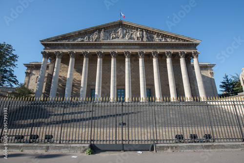 French National Assembly in Paris during a sunny day , France 