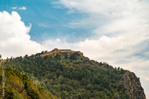 View of Alanya castle from Cleopatra beach on a sunny day