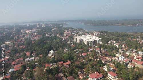 Aerial view of the Gurupura River in Mangaluru, which is close to the Sultan Bathery Ferry Service and apartments and houses in the city. photo