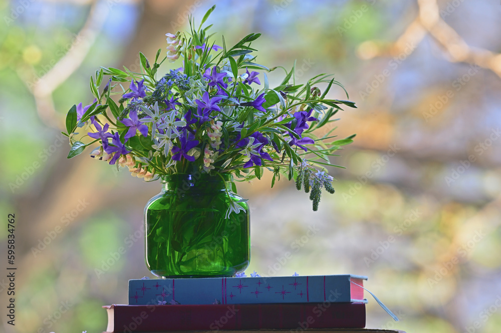 Spring Colorful Flowers in Vase near Window