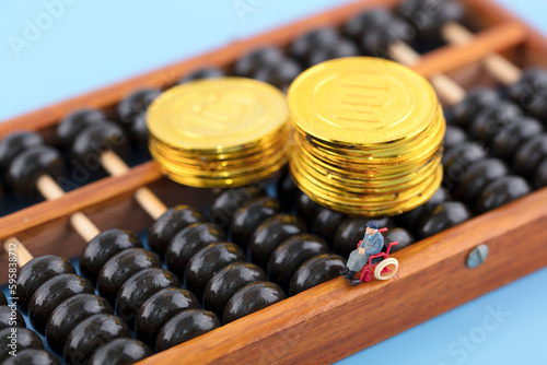 Miniature World Elderly Gold Coins and Abacus